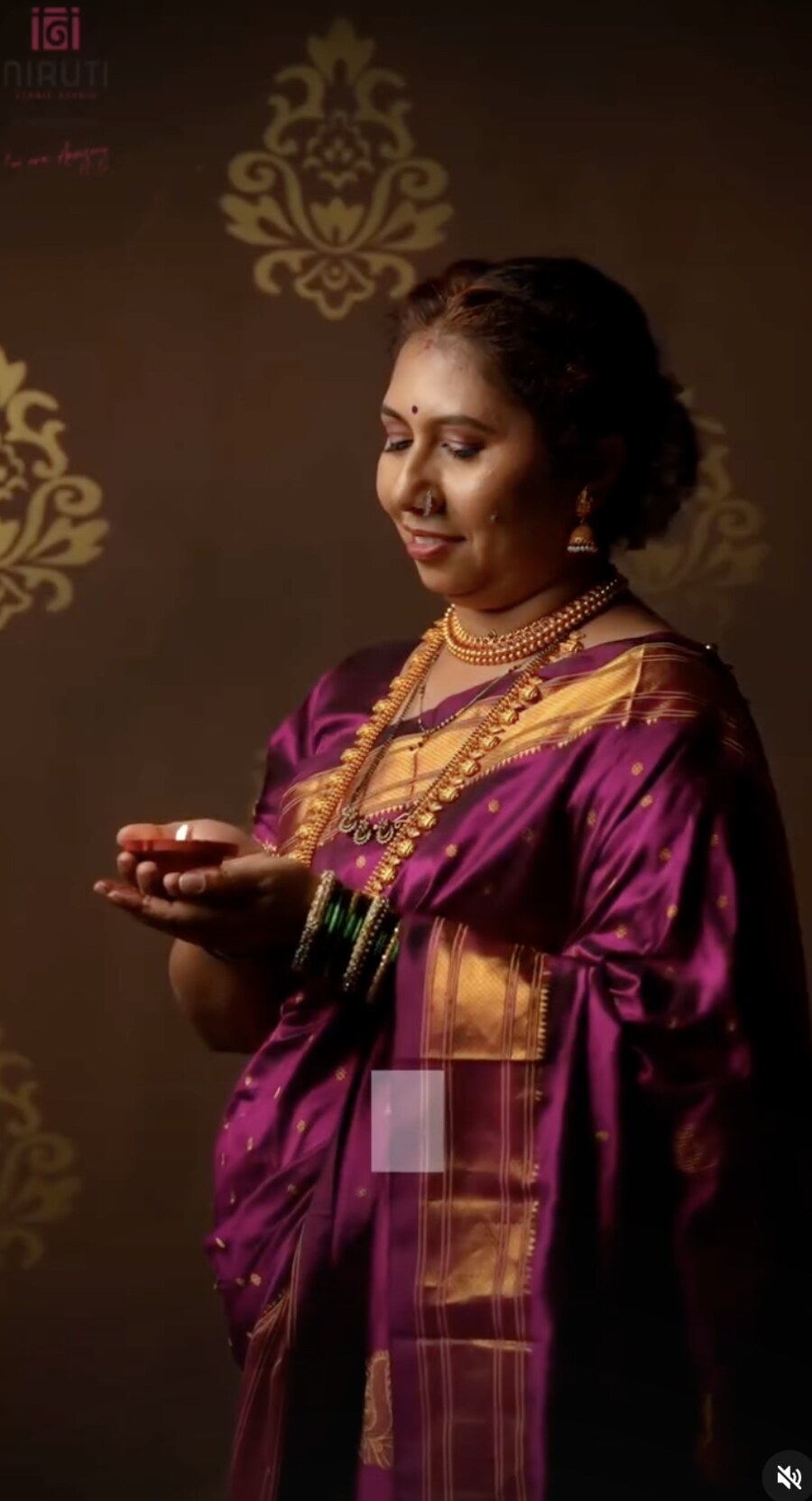 Festive Niruti saree drape